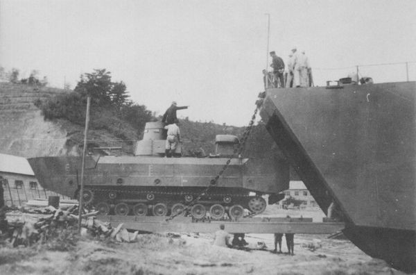 Japanese landing ship No. 149 unloading a Type 3 Ka-Chi amphibious tank, Nasake Island, Kure, Japan, 27 Feb 1944