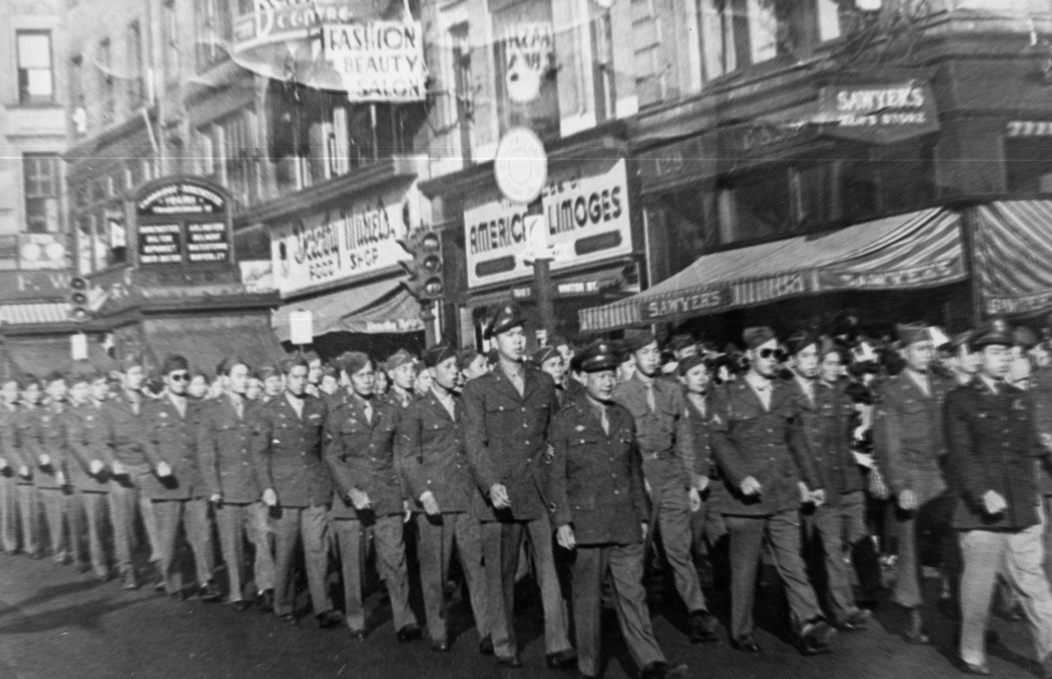 Chinese-American troops on parade for the Veterans Day holiday at the intersection of Tremont Street and Winter Street, Boston, Massachusetts, United States, 11 Nov 1945