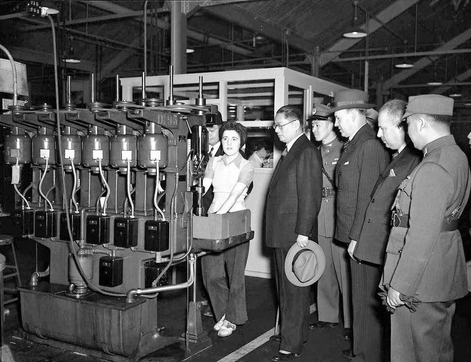 Chinese representatives touring the John Inglis and Company factory, Toronto, Canada, 20 Aug 1943