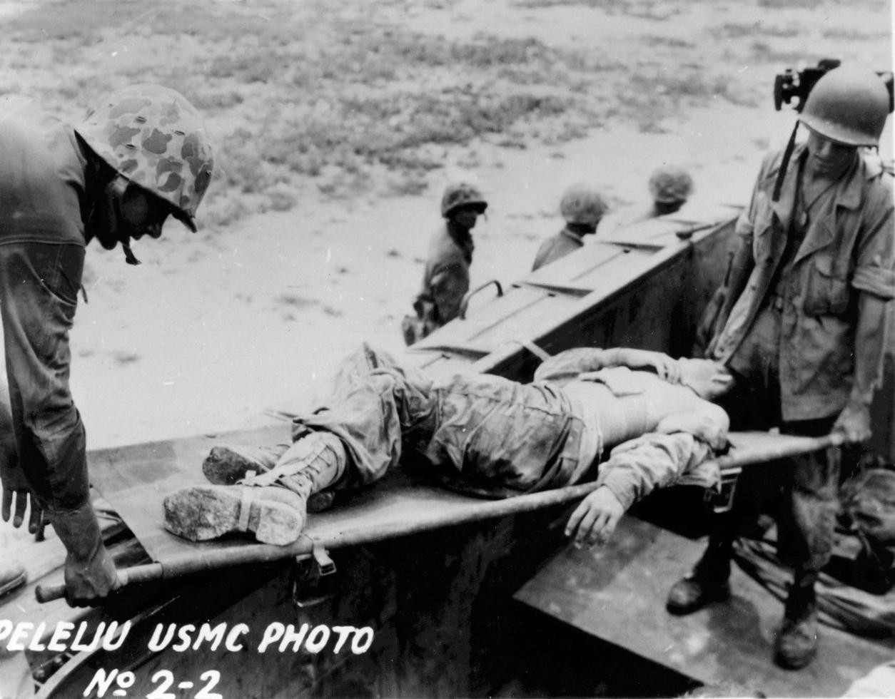 US Marines evacuating wounded comrade, Peleliu, Palau Islands, 1944