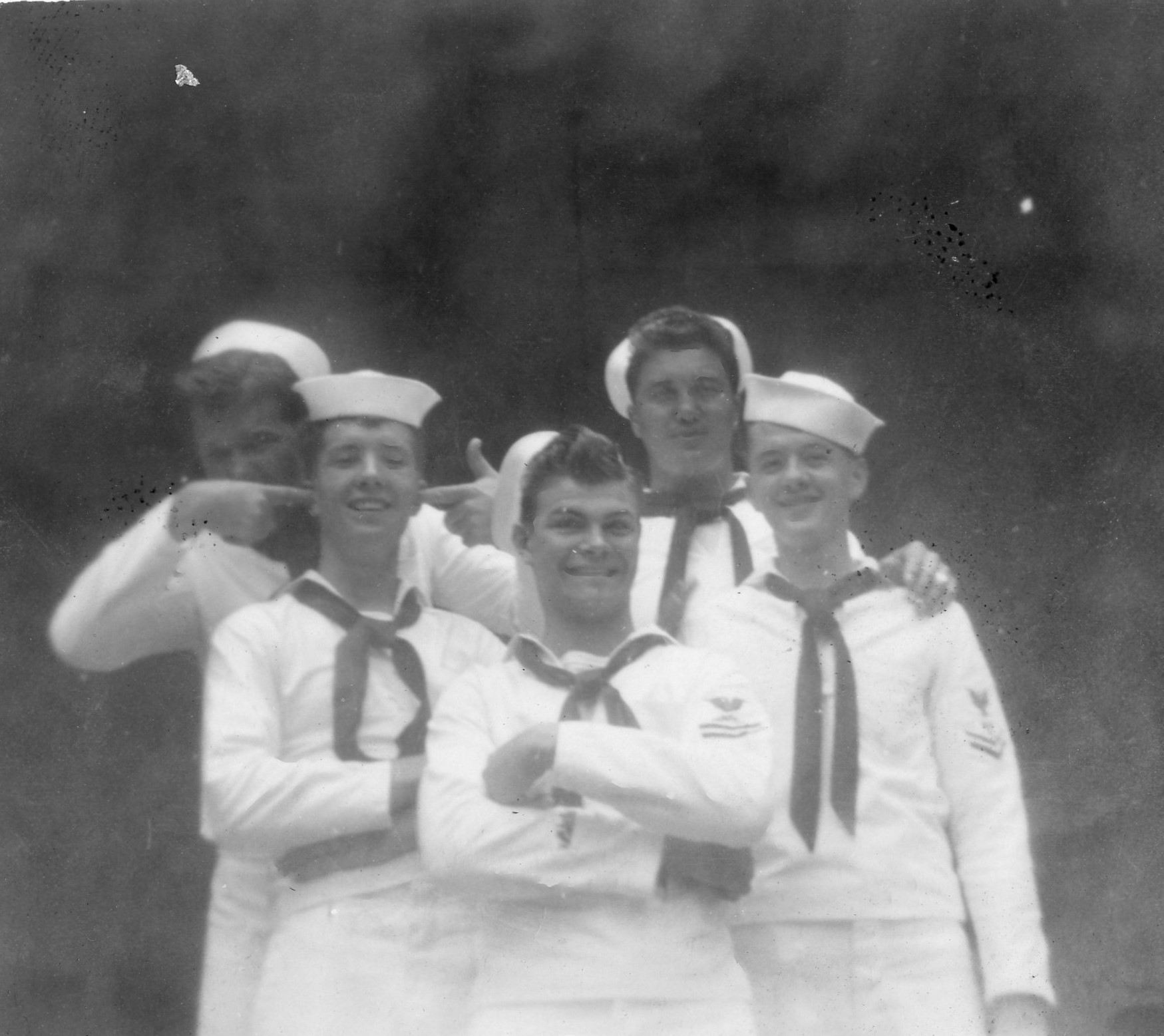 US Navy submariners, 1943-1945; they were likely crewmembers of USS Billfish, USS Bowfin, or USS Burrfish