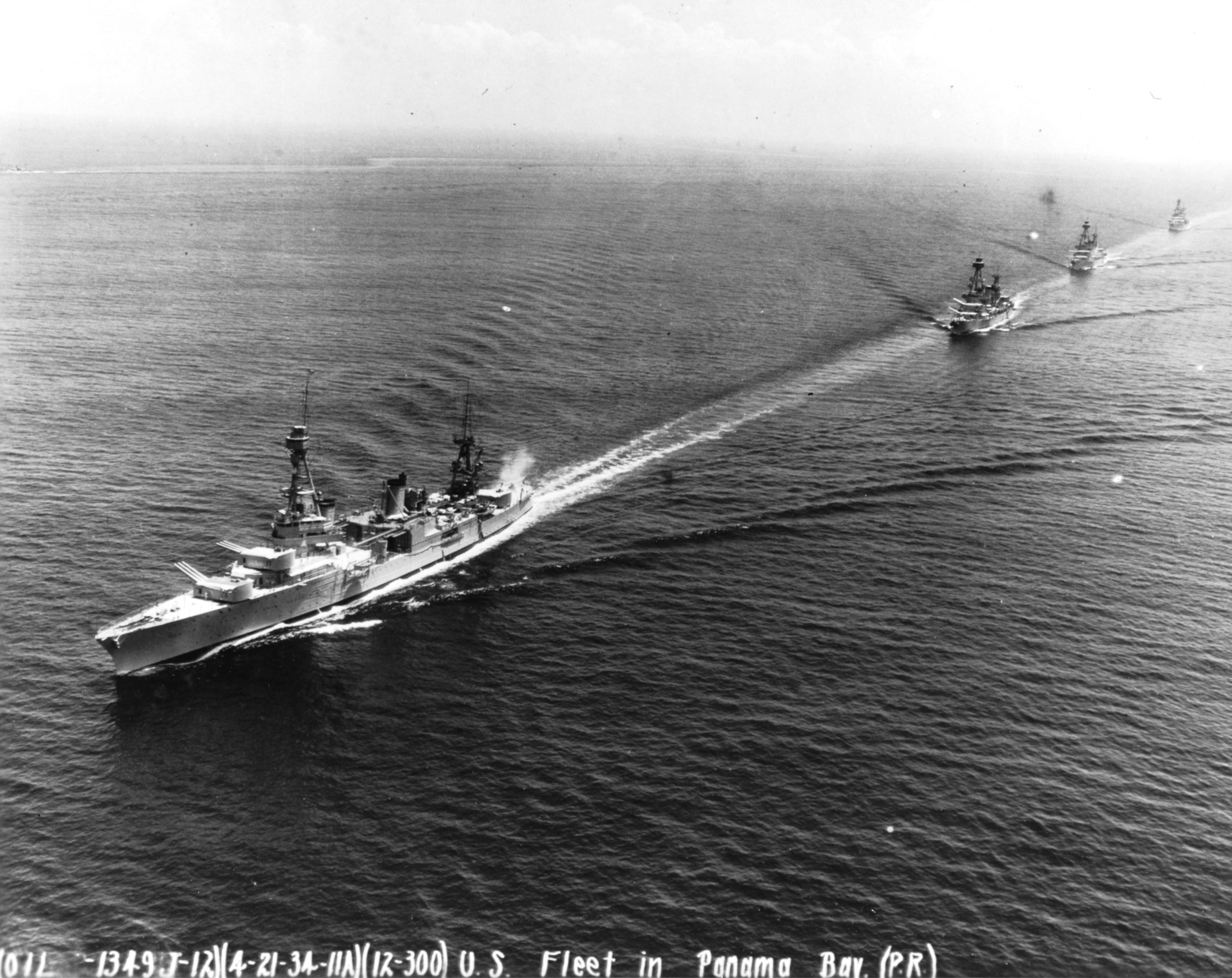 Heavy cruiser USS Chester leading her sister ships, USS Salt Lake City, USS Pensacola, and USS Northampton during Fleet Problem XV in Panama Bay, Panama, 21 Apr 1934.