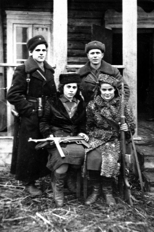 Faye Lazebnik (front row, 1st from right) with fellow resistance fighters of the Molotava Brigade, Poland, 1942-1944