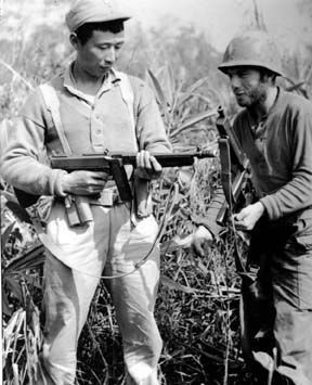 US Army Sargeant Louis Reid with a Chinese soldier, northern Burma, Feb-Mar 1944