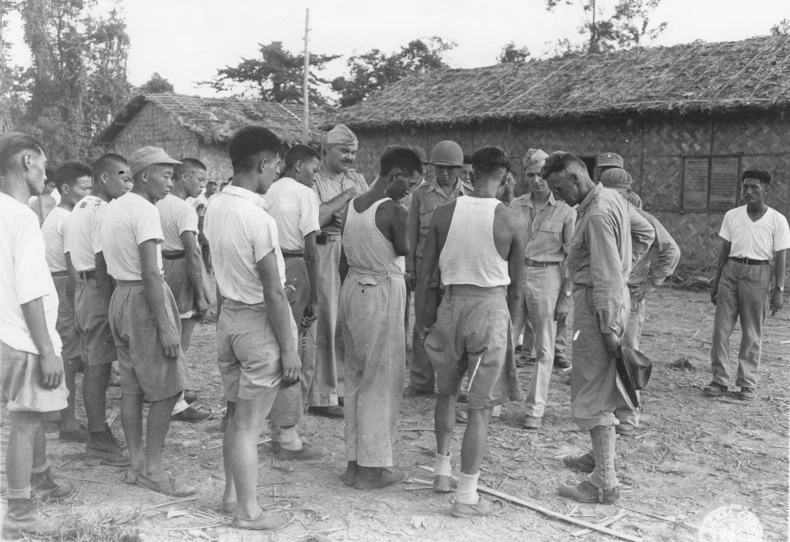 Lieutenant General Joseph Stilwell speaking to Chinese troops at a rehabilitation camp, Assam, India, 15 Jul 1944