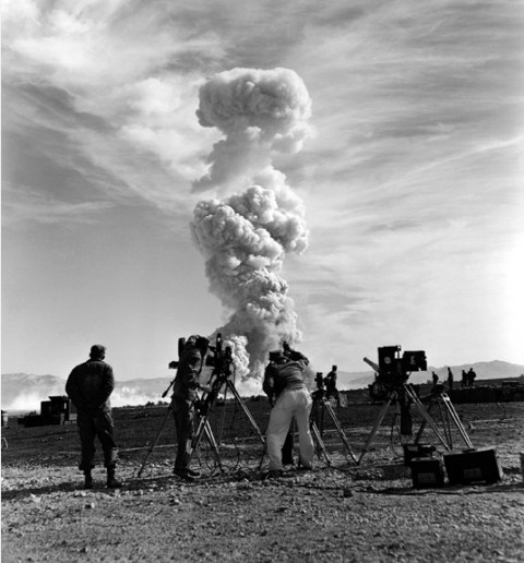 Leslie Elliott (center) filming the Upshot-Knothole Grable atomic test, Nevada Test Site, Nevada, United States, 25 May 1953