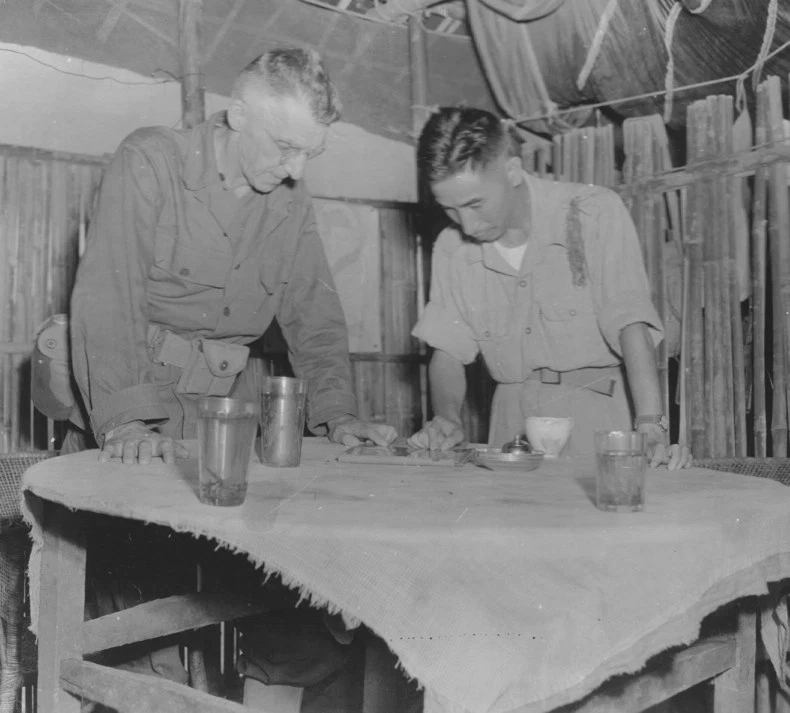 US Lieutenant General Joseph Stilwell speaking with Major General Pan Yukun of Chinese 50th Division, Myitkyina, Burma, 18 Jul 1944
