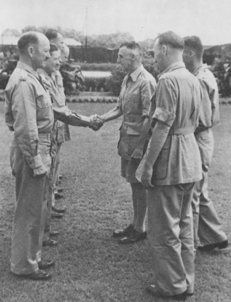 Lieutenant General Joseph Stilwell shaking hands with Major D. M. O'Hara who had just received a Purple Heart medal, India, mid-1942