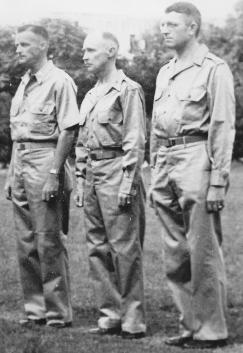 Lieutenant Colonel Frank Dorn, Colonel Robert P. Williams, and Lieutenant Colonel Frank Merrill receiving medals, India, mid-1942