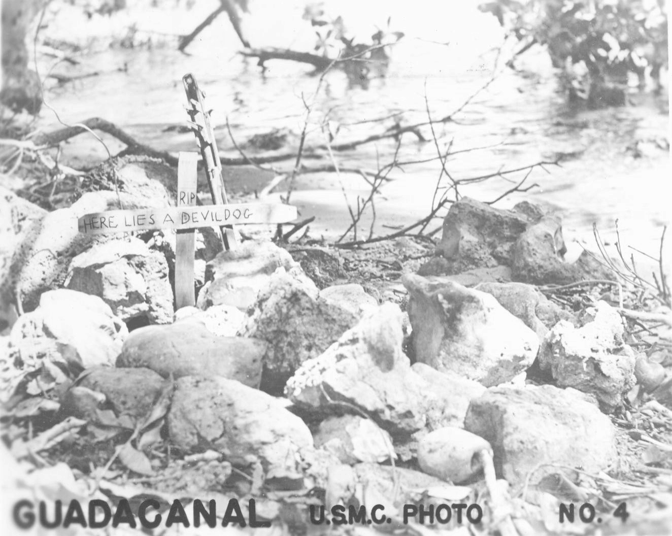 Temporary grave of a fallen US Marine, Lunga Point, Guadalcanal, Oct-Nov 1942