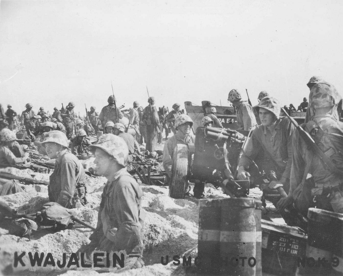 US Marines on a beach on Kwajalein, Marshall Islands, 1 Feb 1944
