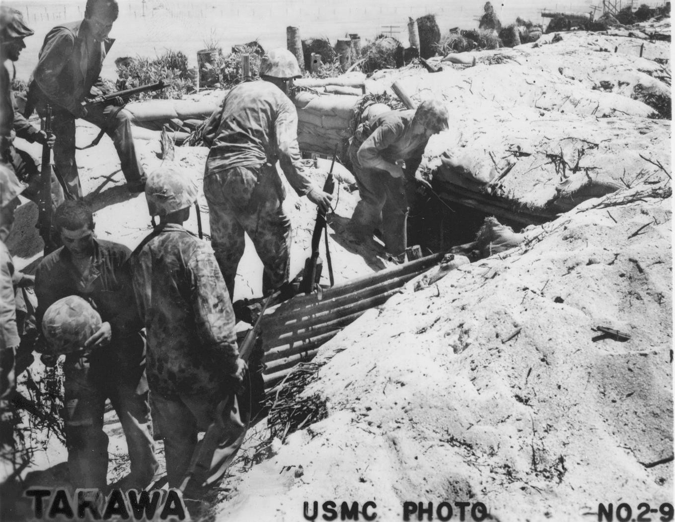 US Marines inspecting Japanese trenches, Tarawa, Gilbert Islands, 20-23 Nov 1943