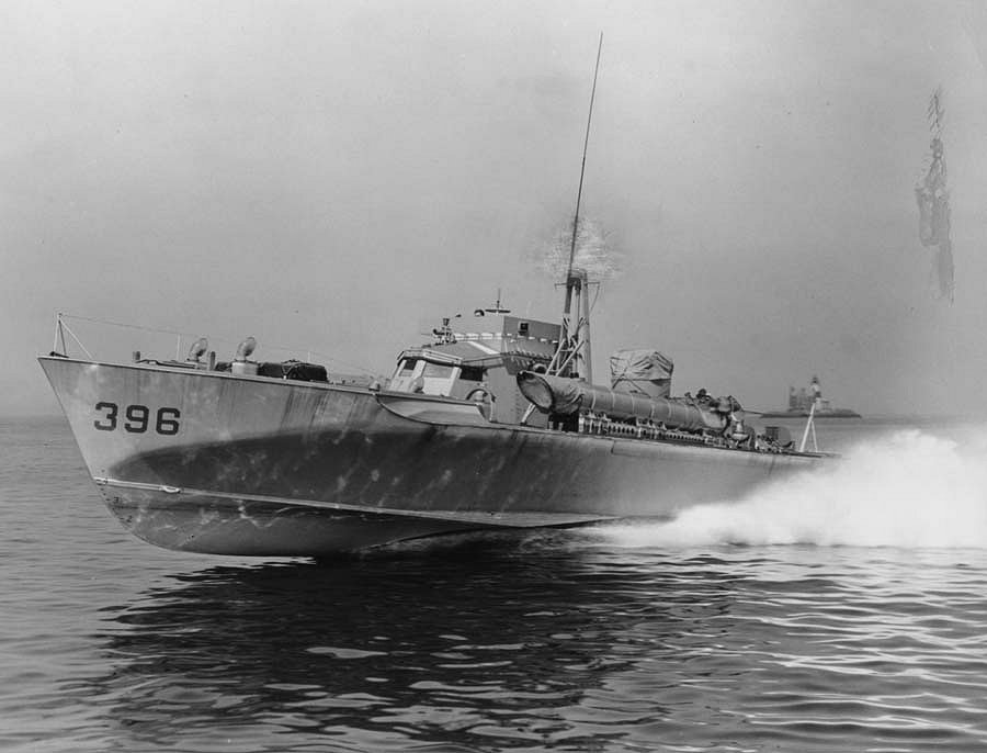 PT-396, an American built British Vosper design 70-foot motor torpedo boat during builder trials off New York, Aug 1944. Note that the censors scratched out the radar atop the mast.