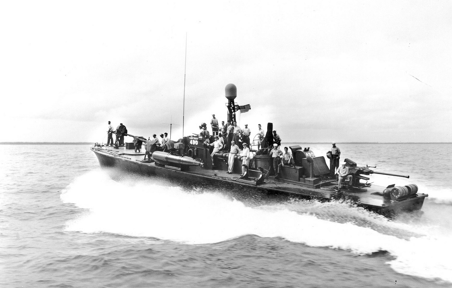 PT-490, an 80-foot Elco motor torpedo boat with MTB Squadron 33, transporting Gen Douglas MacArthur, LGen Robert Eichelberger, and staff from Iloilo on Panay to Bacolod on Negros in the Philippines, 7 Jun 1945.