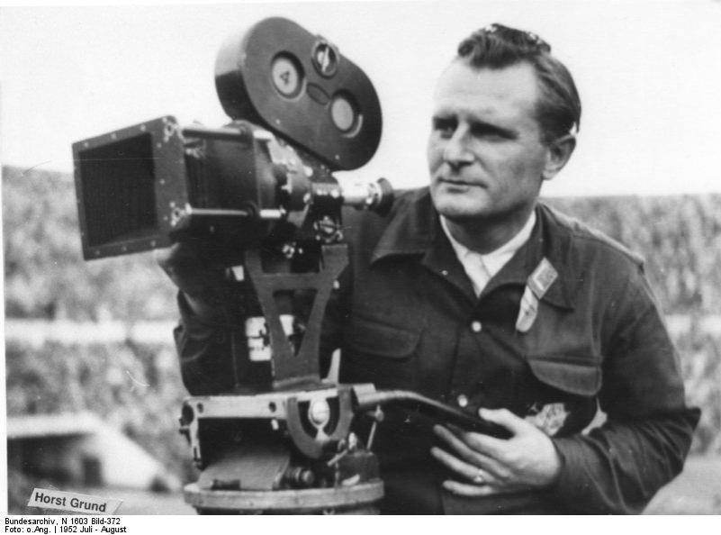 Horst Grund filming the Olympic Games at Helsinki, Finland, Jul-Aug 1952