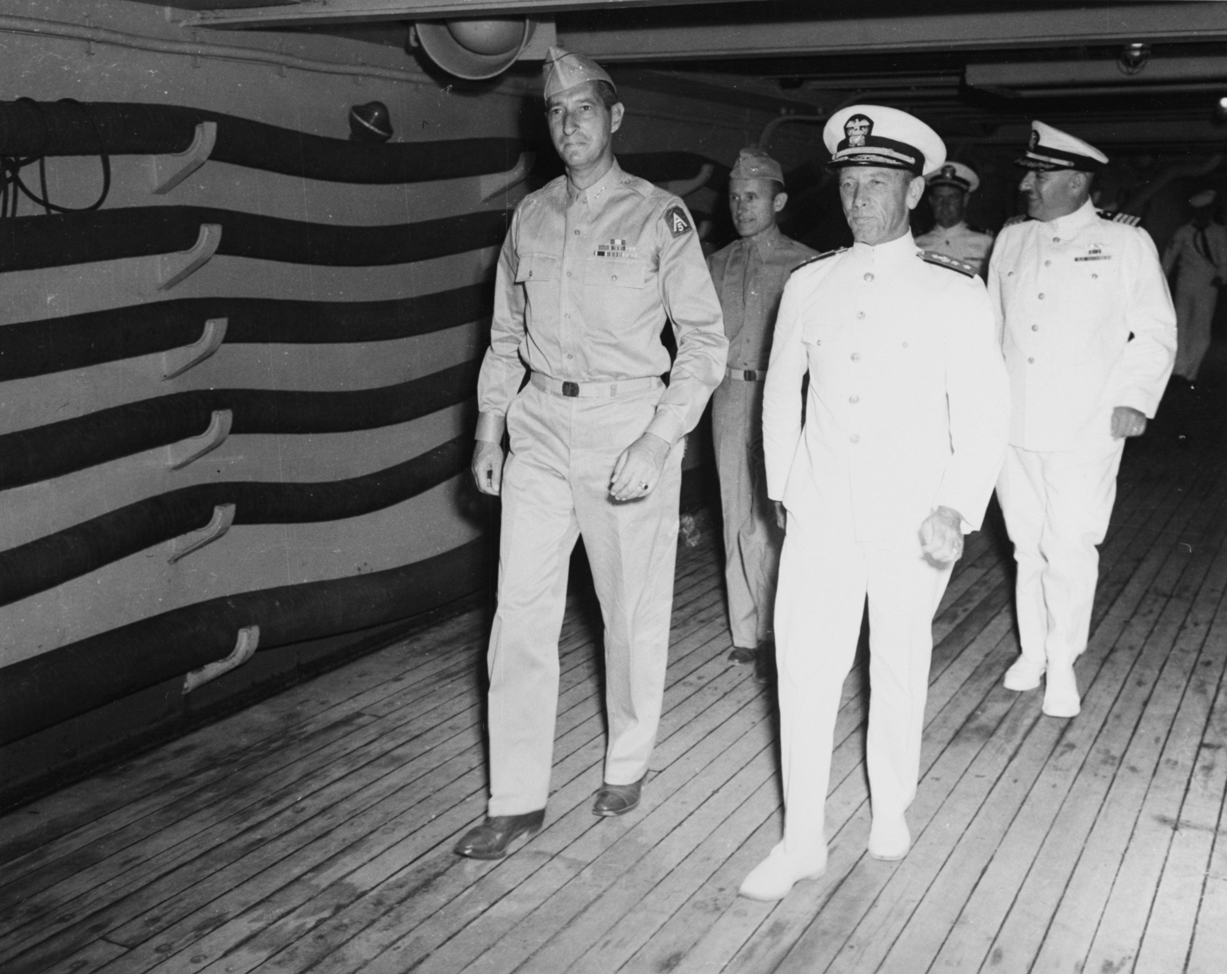 Lieutenant General Mark Clark and Navy Rear Admiral Alan Kirk aboard command ship USS Ancon during the Sicily operations, Mers-el-Kebir, Oran, Algeria, 18 Jul 1943.