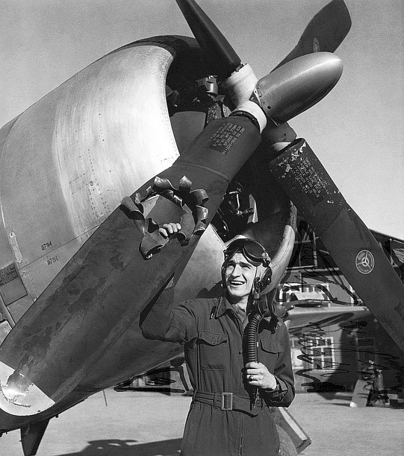 19-year-old pilot Lt Edwin Wright, already with over 80 missions flown, examining flak damage to his P-47 Thunderbolt on a raid to Münster, Austria, Oct 1944. Wright returned safely to his base in Italy.