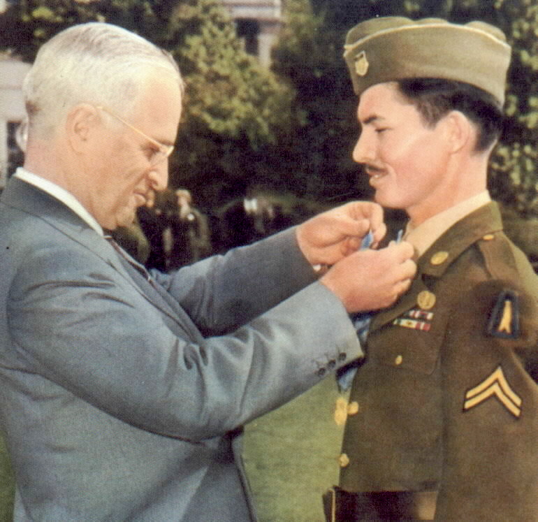 President Truman presenting the Medal of Honor to medical corpsman Desmond Doss at the White House, Washington DC, 12 Oct 1945. The medal was for actions on Okinawa, Japan. Photo 1 of 3.