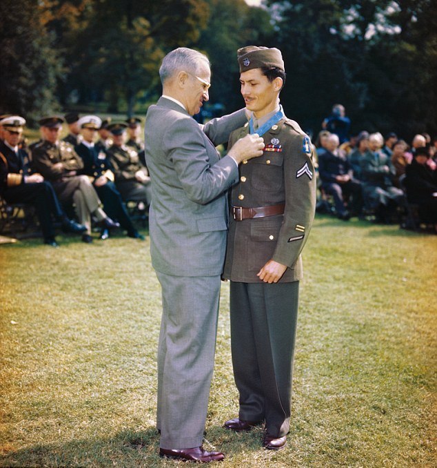 President Truman presenting the Medal of Honor to medical corpsman Desmond Doss at the White House, Washington DC, 12 Oct 1945. The medal was for actions on Okinawa, Japan. Photo 3 of 3.