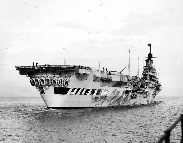 Starboard quarter view of HMS Indomitable at anchor off Norfolk, Virginia, United States, 21 Nov 1941