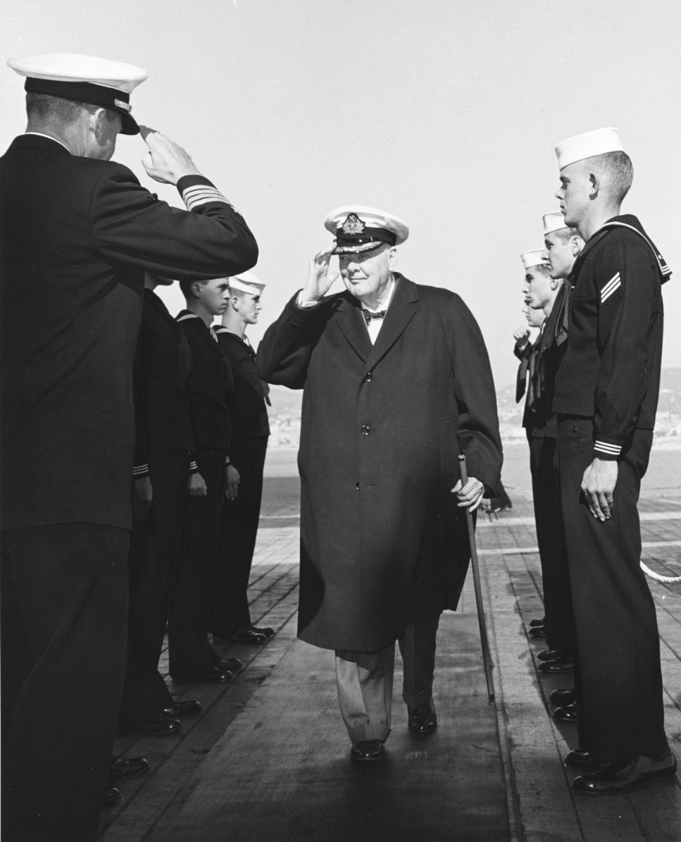 Sir Winston Churchill receiving honors aboard the USS Randolph at Cannes, France, 26 Oct 1958. This was Churchill’s first visit to a warship since World War II.