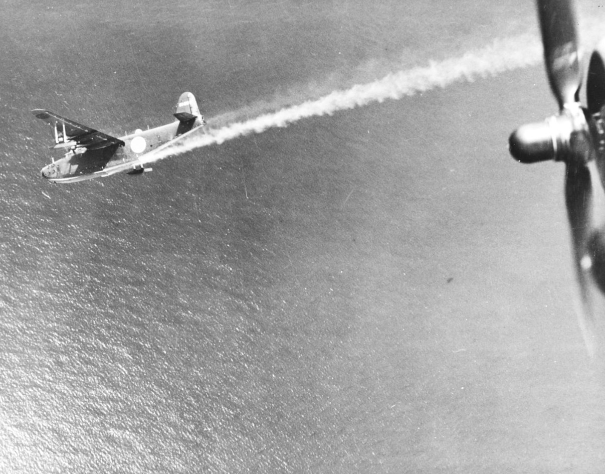 H8K flying boat in the midst of being shot down by the US Navy PB4Y-1 Liberator aircraft of Patrol Squadron VP-115 from which this photograph was taken, 2 Jul 1944. Photo 2 of 2.