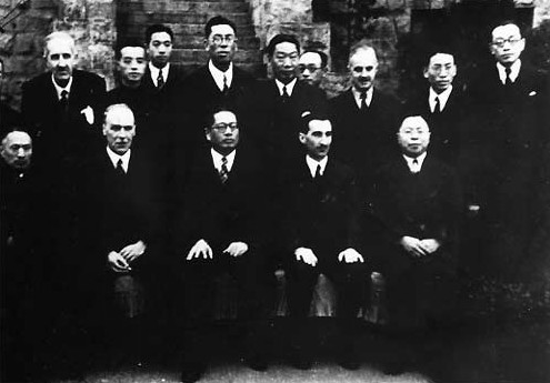 V. K. 'Wellington' Koo, Song Ziwen, Hugh Edward Richardson, and Wu Guozhen upon signing of Sino-British Treaty for Relinquishment of Extra-Territorial Rights in China, Chongqing, China, 11 Jan 1943