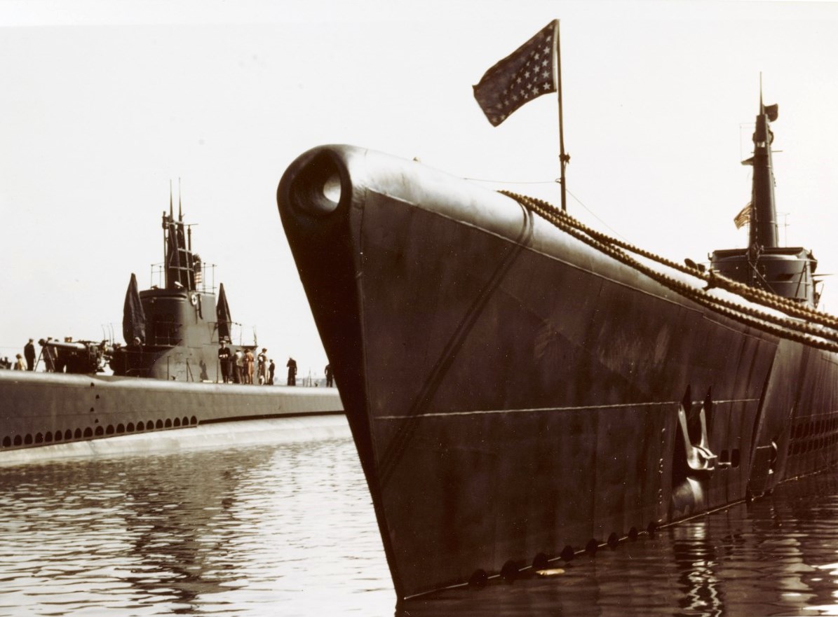 Submarine USS Dace (left) at her commissioning, New London, Connecticut, United States, 23 Jul 1943.