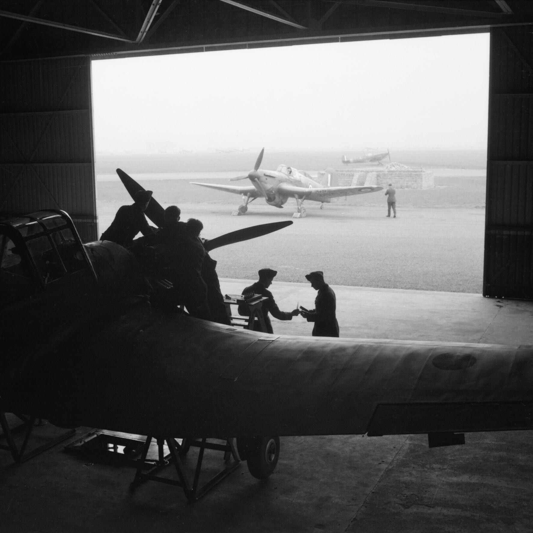 Two Master aircraft and a Spitfire aircraft at RAF Grangemouth, Scotland, United Kingdom, date unknown