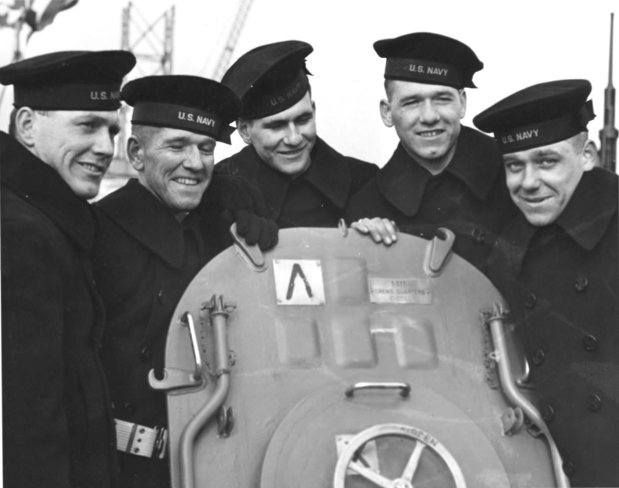 The five Sullivan brothers aboard USS Juneau upon her commissioning at New York Navy Yard, 14 Feb 1942. Left to Right they are Joseph, Francis, Albert, Madison, and George. All five were later lost with the ship.