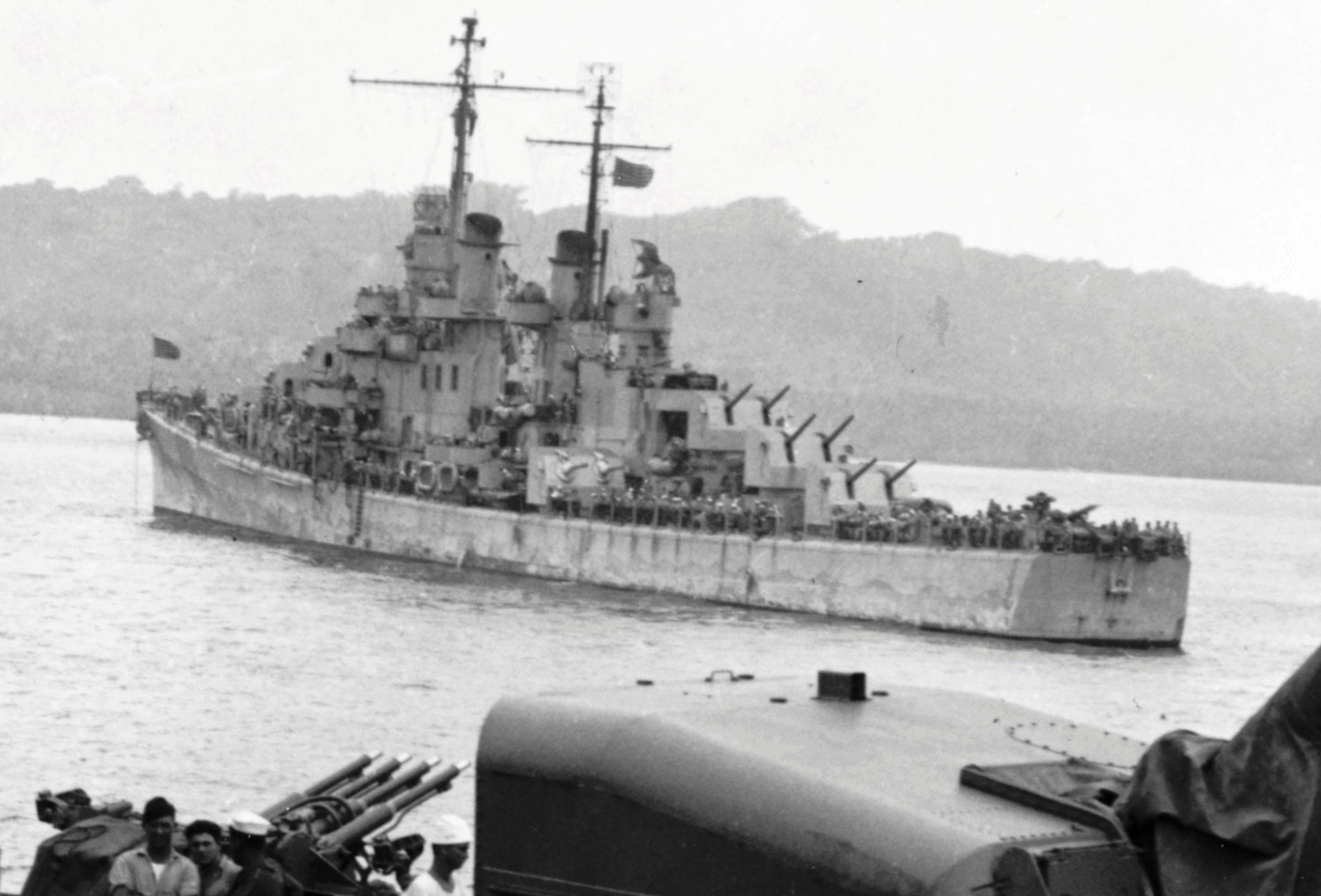 Destroyer USS Laffey (foreground) and cruiser USS Juneau in Luganville anchorage, Espiritu Santo, New Hebrides, 16 Sep 1942. Both ships arrived with survivors of the sunken USS Wasp (Wasp-class). Photo 4 of 4.