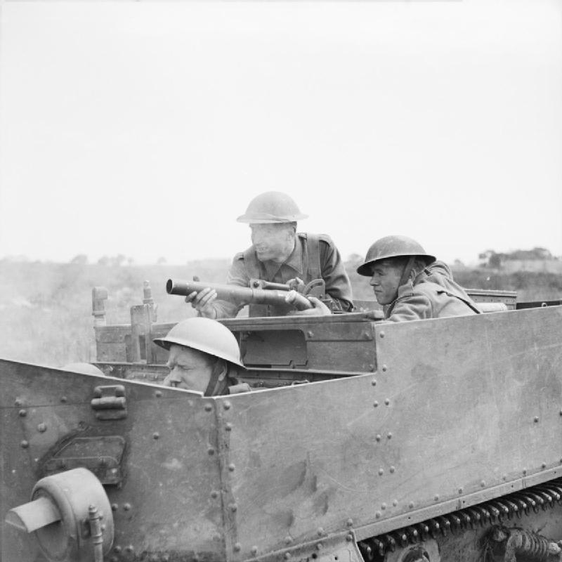 Universal Carrier and crew of UK 2nd Sherwood Foresters regiment, Anzio, Italy, Apr 1944; note 2-inch mortar