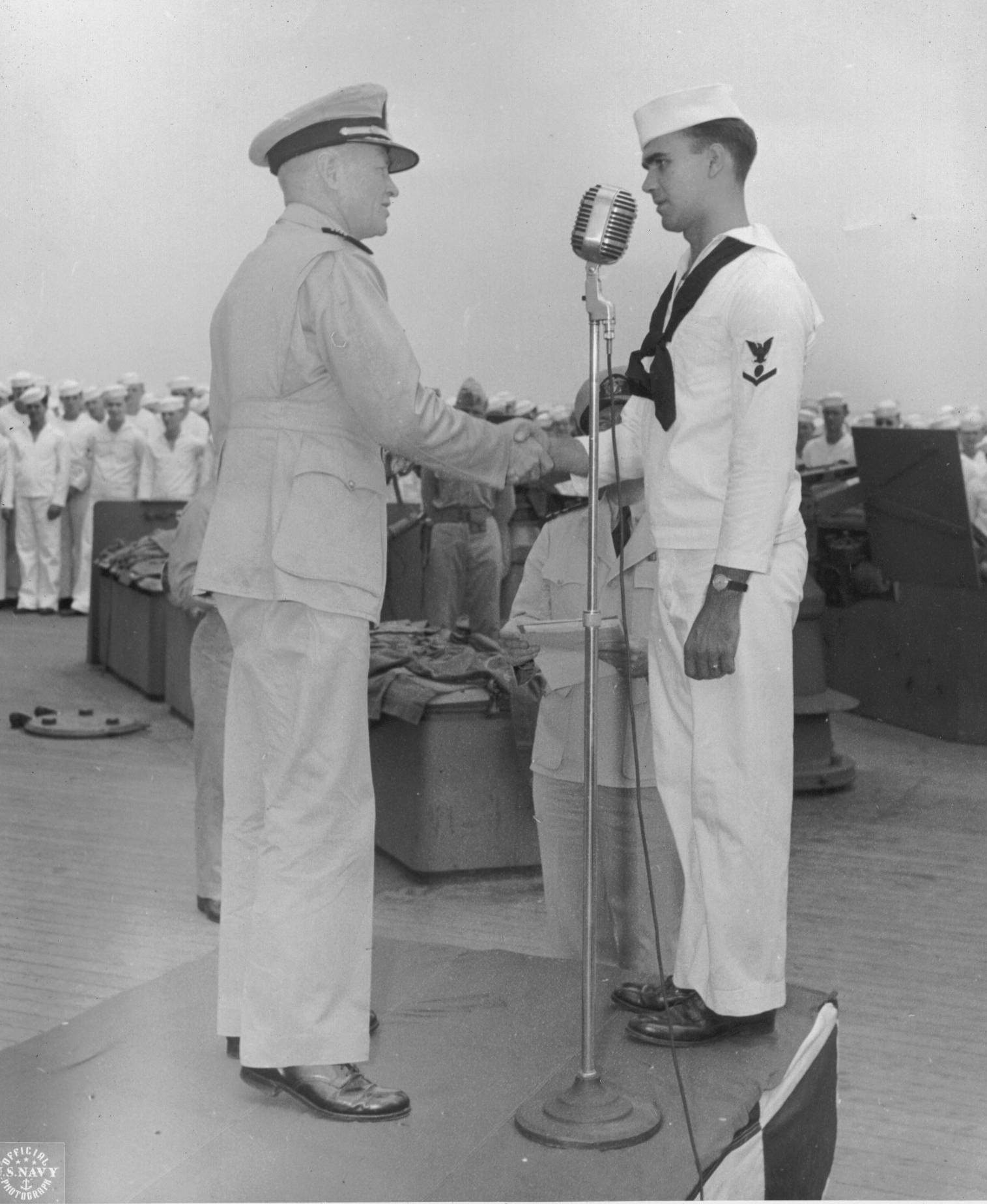 Captain Carl Holden at an award ceremony aboard USS New Jersey, 24 Jul 1943, photo 2 of 2