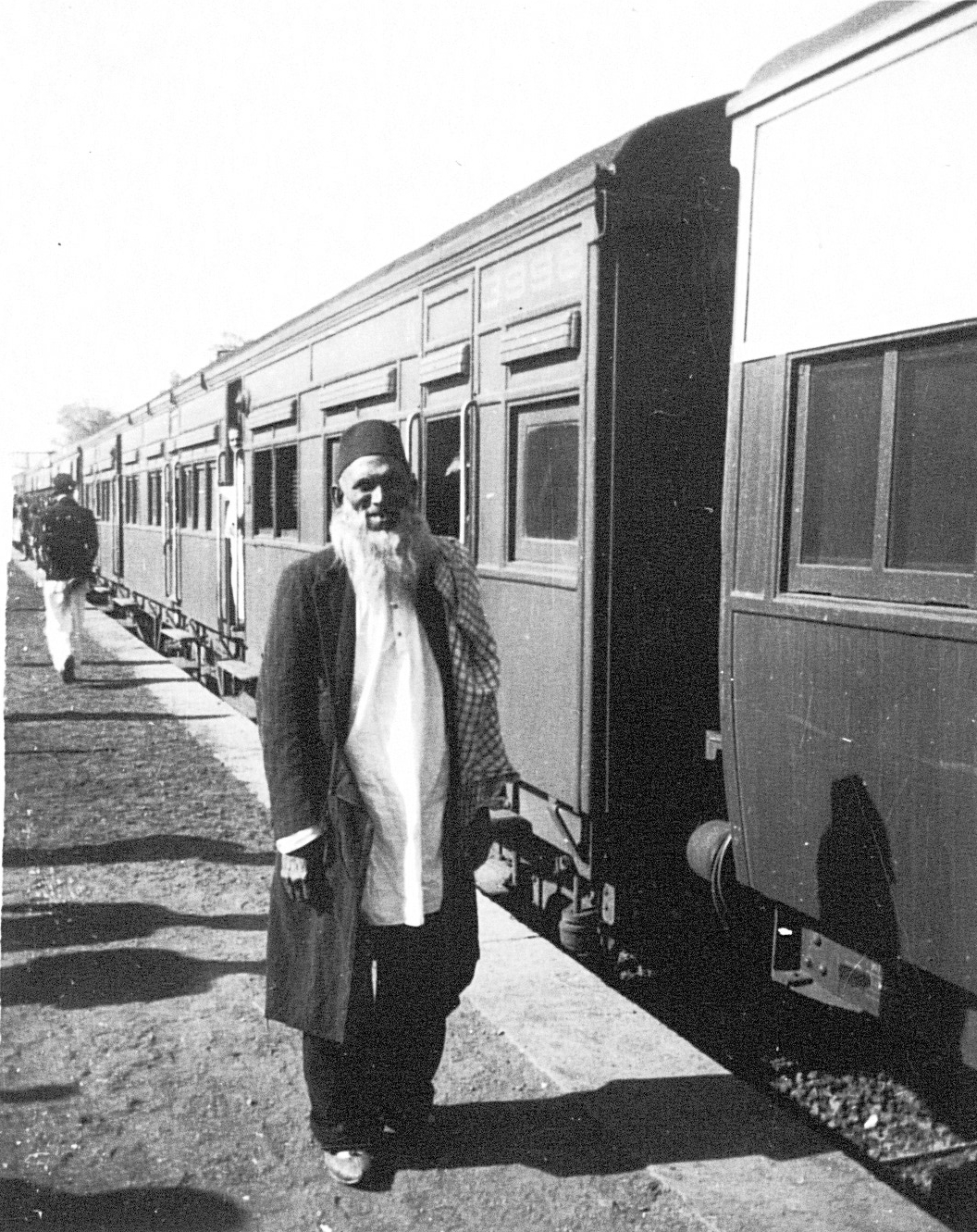 Civilian at a rail station, Calcutta, India, late 1944