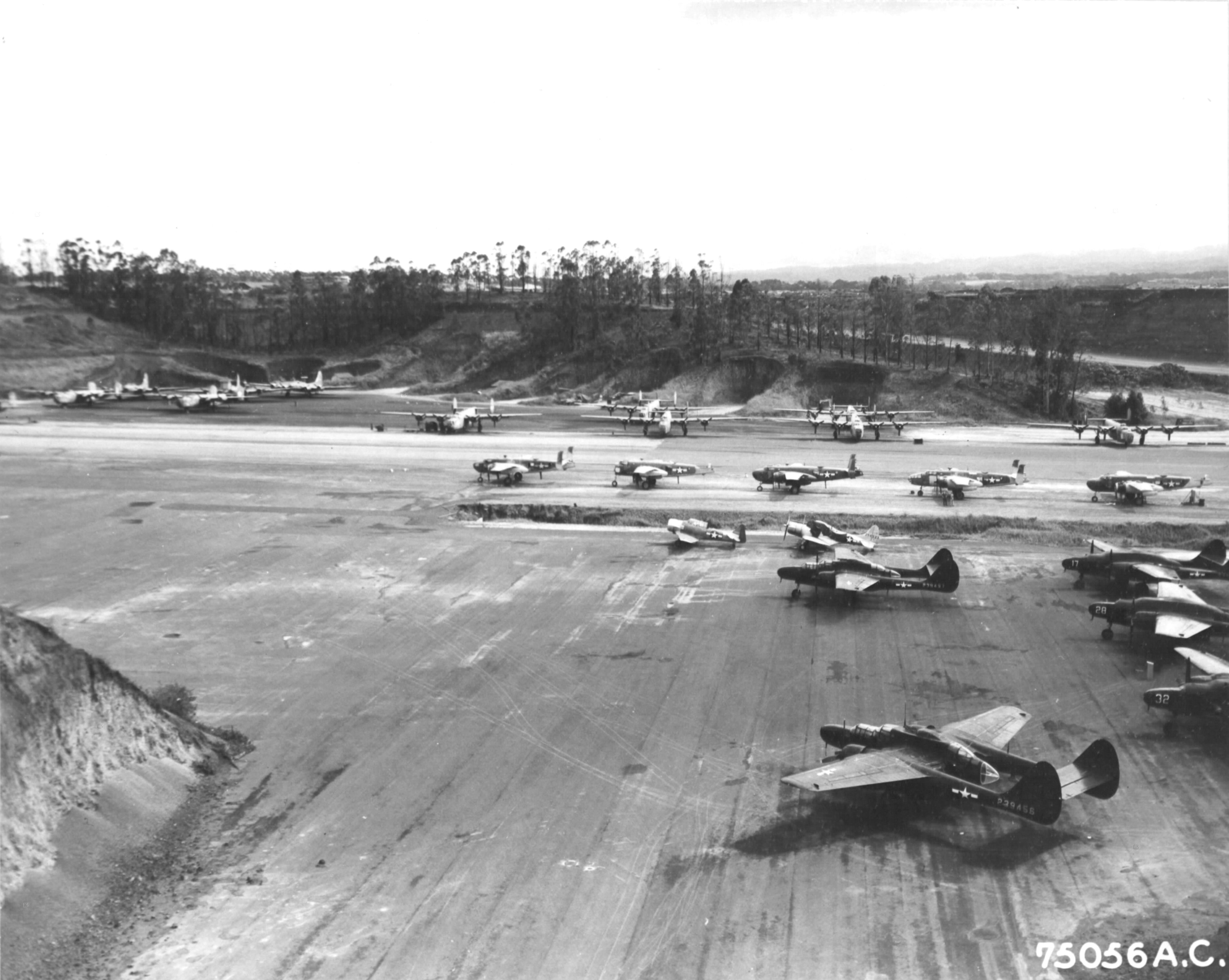 War weary aircraft at the Wheeler Field graveyard (Waieli Gulch airstrip), Oahu, Hawaii, 4 Apr 1945. Photo 1 of 2.