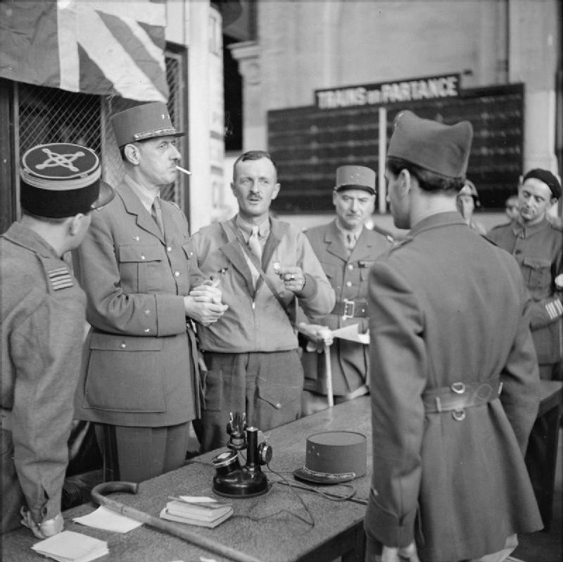 Charles de Gaulle, Philippe Leclerc, and others at Montparnasse railway station, Paris, France, 25 Aug 1944
