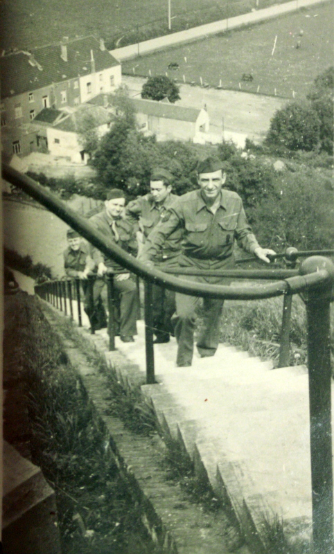 US servicemen climbing the steps of the Lion's Mound, Braine-l'Alleud, Belgium, May 1945