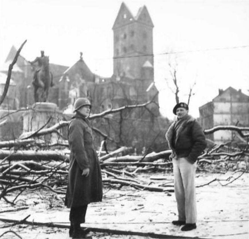 Major General William Simpson and Field Marshal Bernard Montgomery touring the city of Aachen, Germany, 31 Dec 1944. Ten weeks earlier, Aachen became the first city inside Germany to be occupied by the Allies.