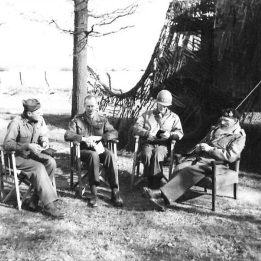 Generals Matthew Ridgway of the US XVIII Airborne Corps, Miles Dempsey of the 2nd British Army, William Simpson of the US 9th Army, and Bernard Montgomery at Dempsey’s headquarters, 25 Mar 1945, discussing the recent crossing of the Rhine.
