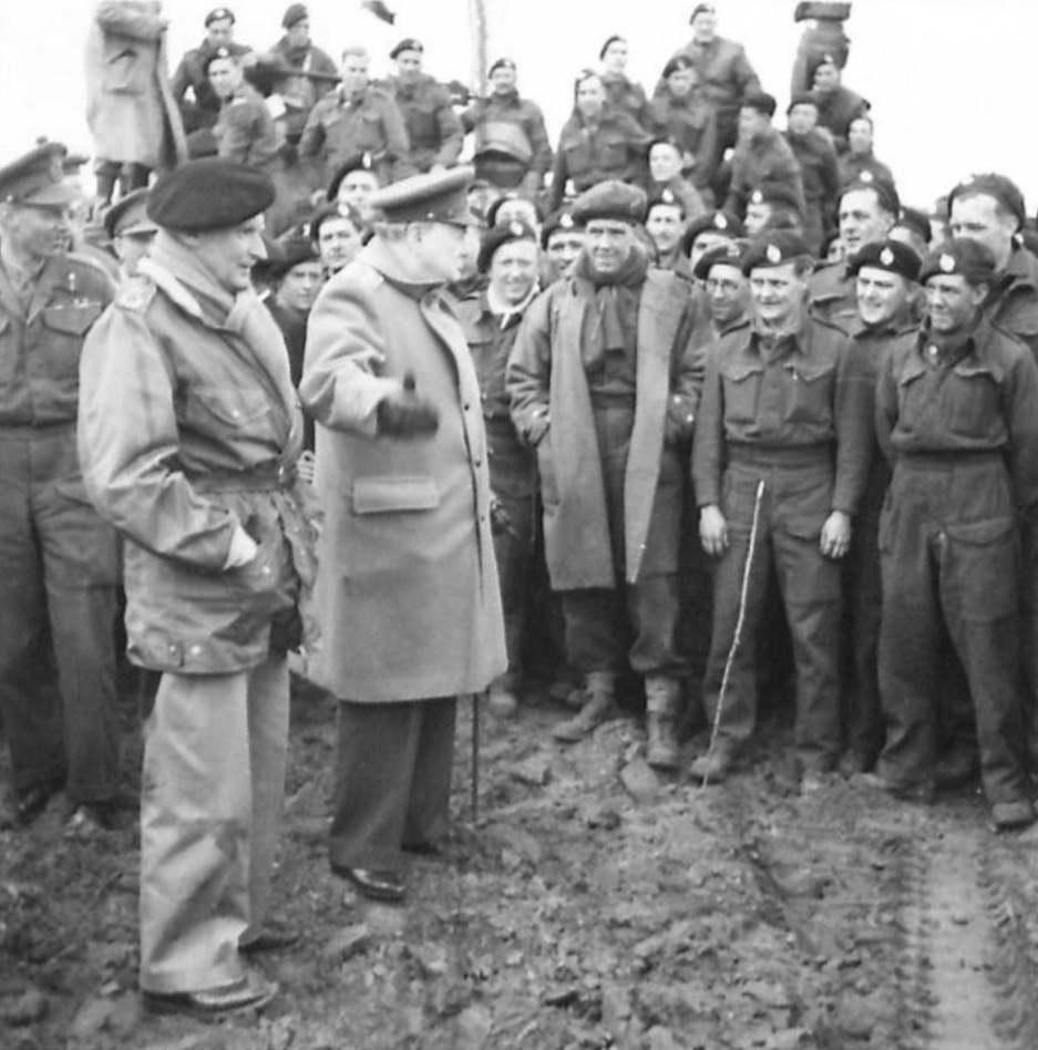 British Prime Minister Winston Churchill and Field Marshal Bernard Montgomery with the men of 79th Armoured Division, 25 Mar 1945. General Miles Dempsey is at left.