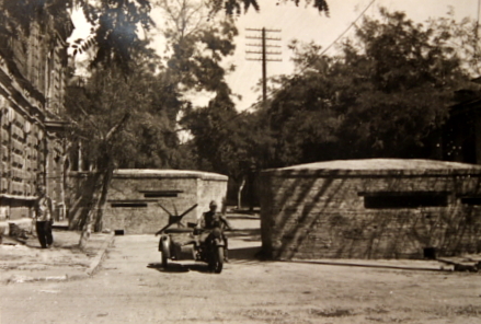 German soldier with motorcycle, date and location unknown