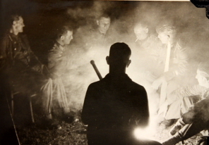 German soldiers around a camp fire, date and location unknown