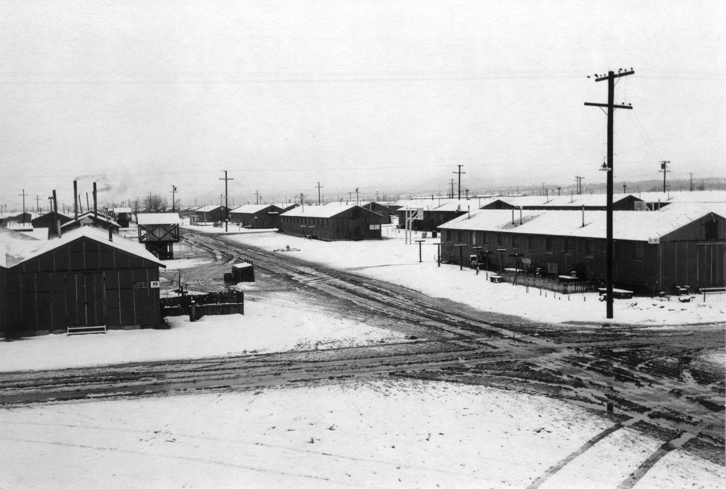 Snow covered barracks at the Manzanar Relocation Center for deported Japanese-Americans, Inyo County, California, United States, 1943.
