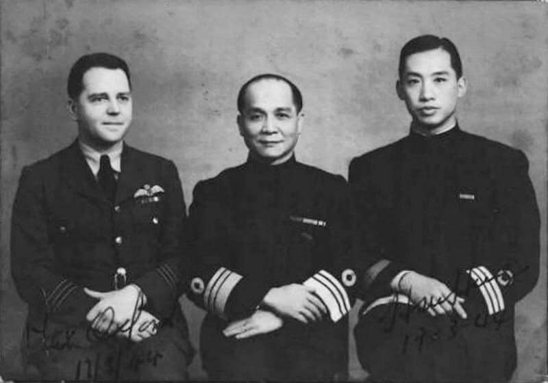 Portrait of British RAF Acting Wing Commander Maxwell Norman Oxford, Chinese Navy Admiral Chan Chak, and Chinese Navy Commander Xu Heng, China, 17 Mar 1944; note Oxford and Xu's autographs