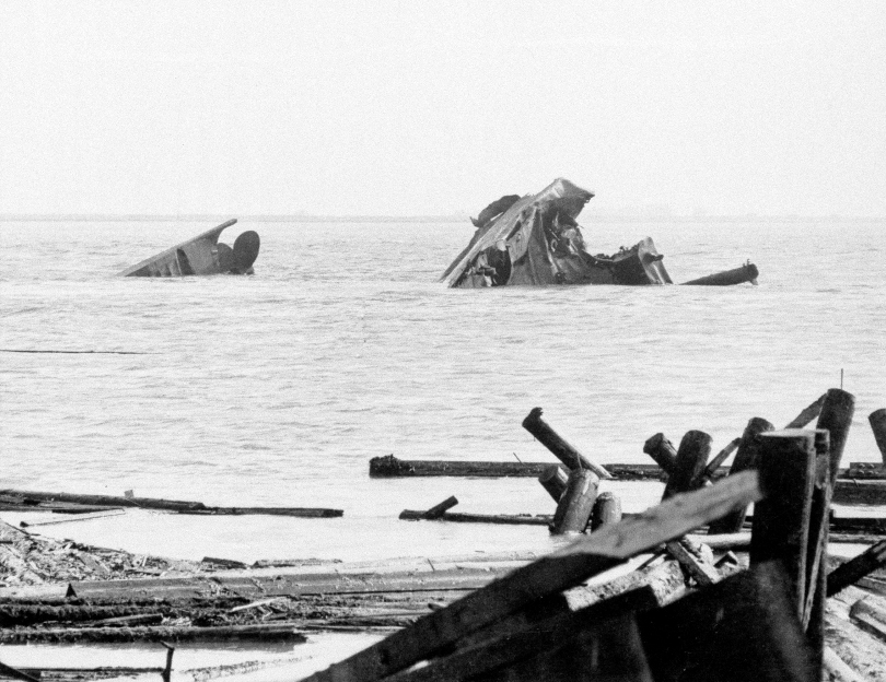 Twisted wreckage of the Victory-ship SS Quinault Victory after being demolished in a munitions explosion at Port Chicago, California, United States, 17 Jul 1944. 18 Jul 1944 photo.