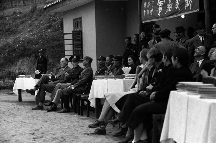 He Yingqin and others during an air force presentation at the Second Plenary Session of the National Political Council, Chongqing, China, 17 Nov 1941, photo 1 of 2
