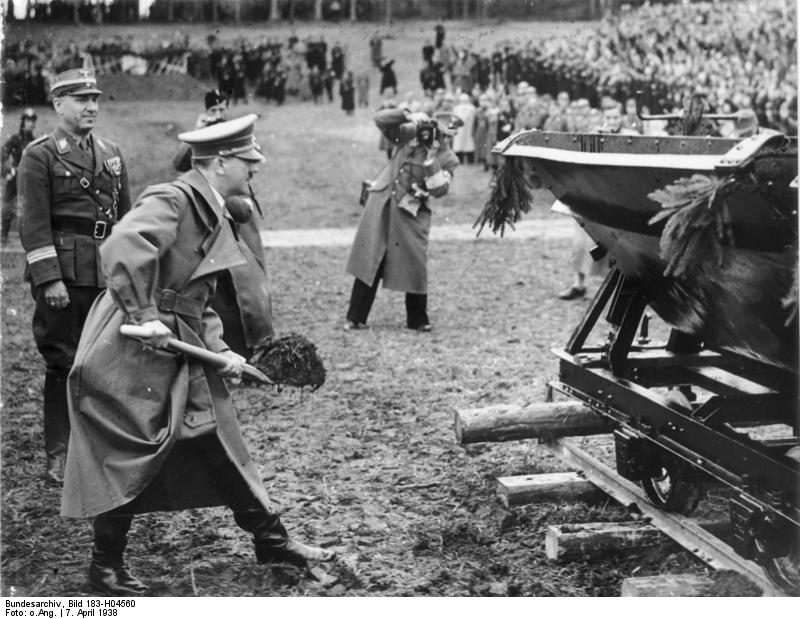 Adolf Hitler at the groundbreaking ceremony of the Reichsautobahn project, Walserberg, Austria, 7 Apr 1938; note Fritz Todt behind Hitler