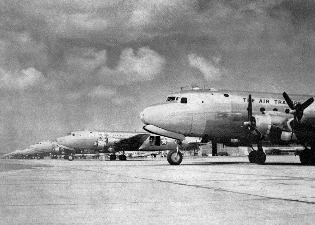 C-54 Skymaster transports lined up at Borinquen Field, Puerto Rico as part of Operation Green, the airlift of personnel from Europe to the Pacific, 1945.