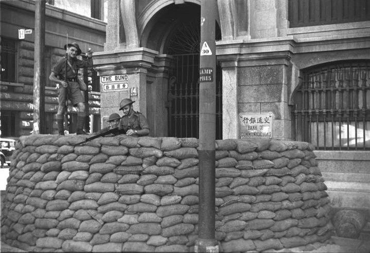 Shanghai Volunteer Corps behind a barricade in the Bund, Shanghai, China, mid-1937, photo 1 of 2