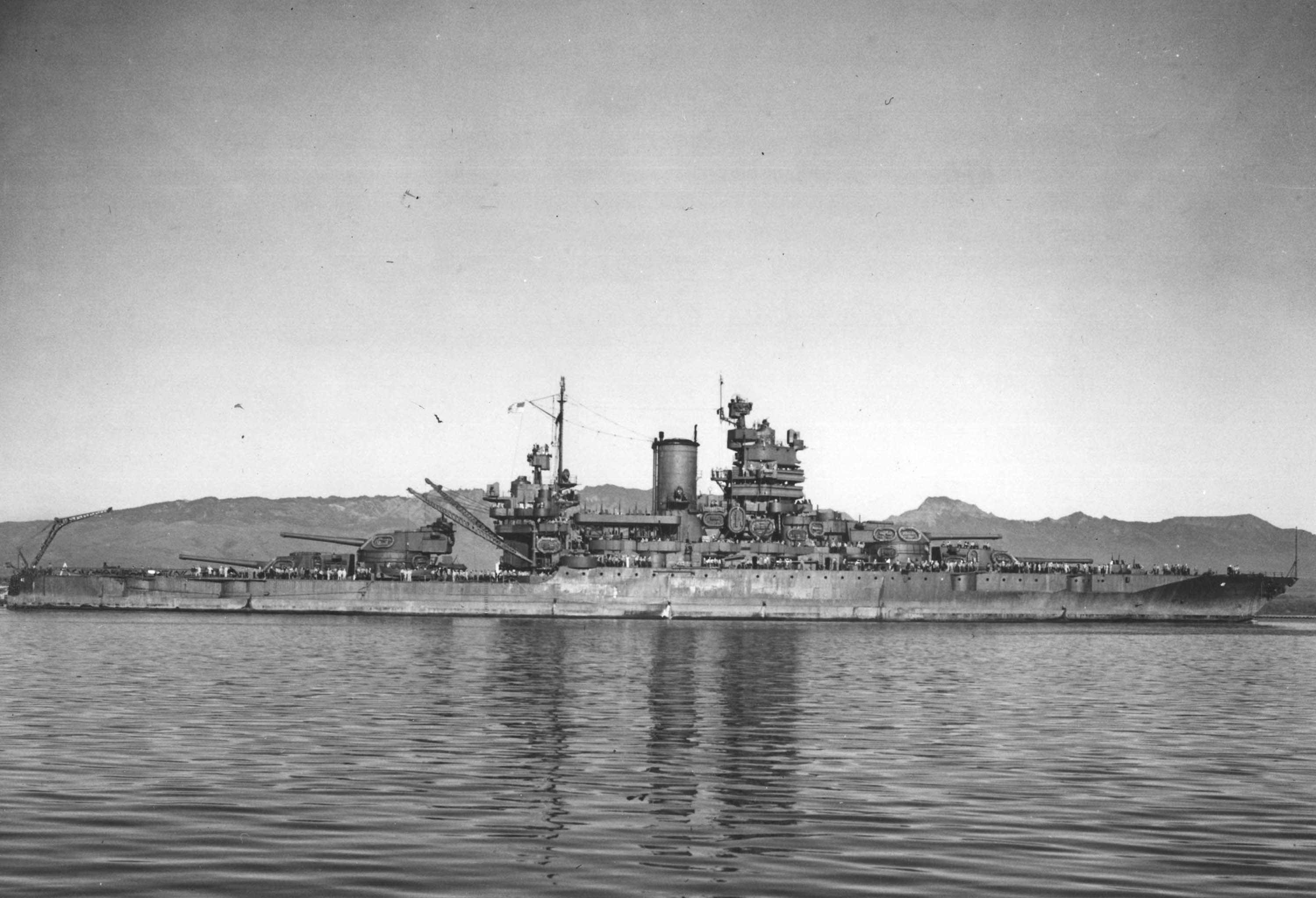 Battleship USS Mississippi entering Pearl Harbor, Hawaii, 2 Mar 1943.